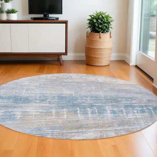 8' Blue and Yellow Round Abstract Non Skid Area Rug Photo 1