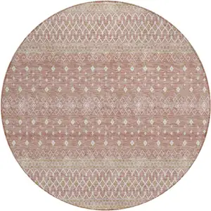 Photo of 8' Blush Gold And Ivory Round Tribal Washable Indoor Outdoor Area Rug