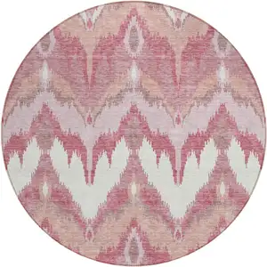 Photo of 8' Blush Mauve And Ivory Round Ikat Washable Indoor Outdoor Area Rug