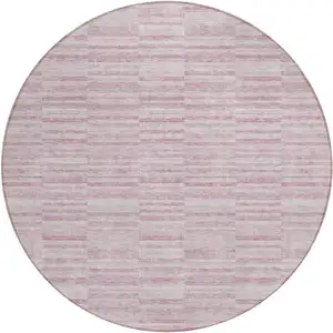 Photo of 8' Blush Pink And Beige Round Striped Washable Indoor Outdoor Area Rug