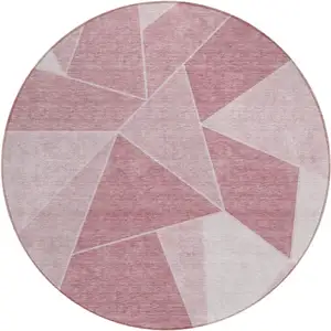 Photo of 8' Blush Pink And Ivory Round Geometric Washable Indoor Outdoor Area Rug