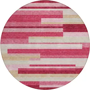 Photo of 8' Blush Pink And Mauve Round Striped Washable Indoor Outdoor Area Rug