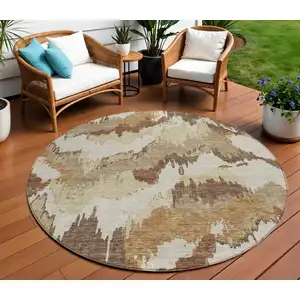 Photo of 8' Brown And Beige Round Abstract Washable Indoor Outdoor Area Rug