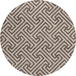 Photo of 8' Brown And Beige Round Geometric Washable Indoor Outdoor Area Rug