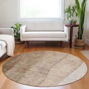 Photo of 8' Brown And Beige Round Ombre Washable Indoor Outdoor Area Rug