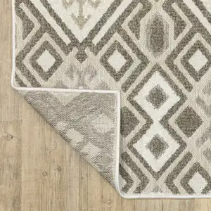 Photo of 8' Brown And Beige Tribal Runner Rug