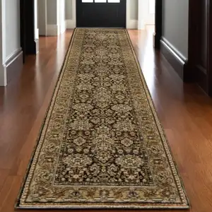 Photo of 12' Brown And Gold Oriental Runner Rug