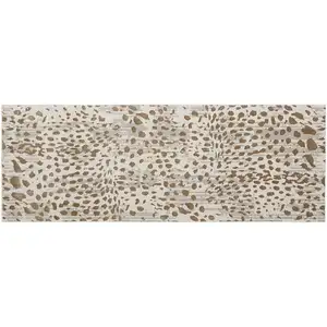 Photo of 8' Brown And Ivory Abstract Stain Resistant Runner Rug