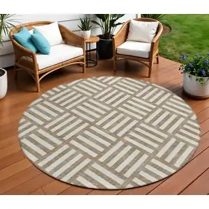 Photo of 8' Brown And Ivory Round Geometric Washable Indoor Outdoor Area Rug