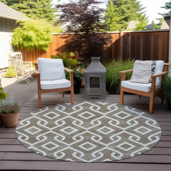 8' Brown And Ivory Round Geometric Washable Indoor Outdoor Area Rug Photo 8