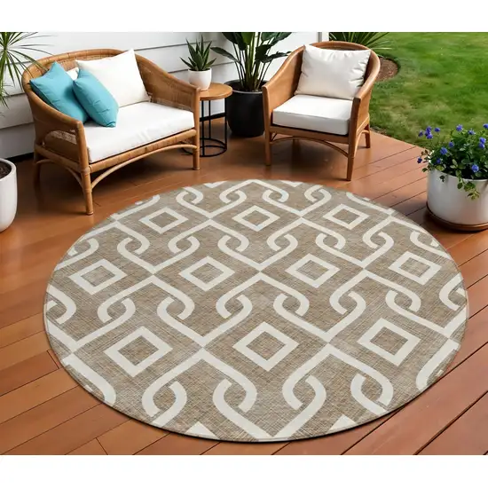 8' Brown And Ivory Round Geometric Washable Indoor Outdoor Area Rug Photo 1