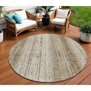 Photo of 8' Brown And Ivory Round Striped Washable Indoor Outdoor Area Rug