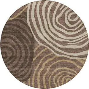 Photo of 8' Brown And Taupe Round Abstract Washable Indoor Outdoor Area Rug