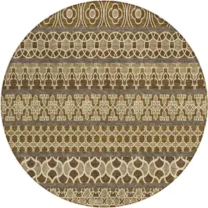 Photo of 8' Brown And Taupe Round Quatrefoil Washable Indoor Outdoor Area Rug