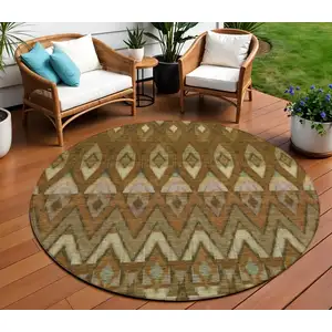 Photo of 8' Brown Beige And Artichoke Green Round Southwestern Washable Indoor Outdoor Area Rug