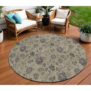 Photo of 8' Brown Beige And Chocolate Round Floral Washable Indoor Outdoor Area Rug