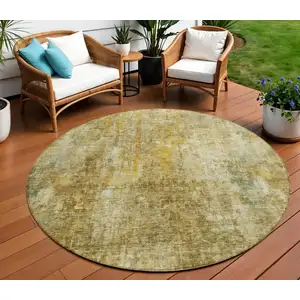 Photo of 8' Brown Beige And Gold Round Abstract Washable Indoor Outdoor Area Rug