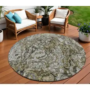 Photo of 8' Brown Beige And Tan Round Abstract Washable Indoor Outdoor Area Rug