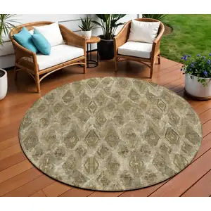 Photo of 8' Brown Beige And Tan Round Geometric Washable Indoor Outdoor Area Rug