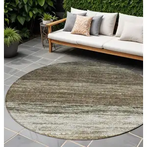 Photo of 8' Brown Beige And Tan Round Ombre Washable Indoor Outdoor Area Rug