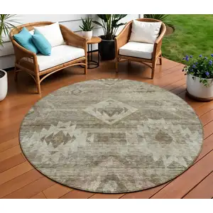 Photo of 8' Brown Beige And Tan Round Southwestern Washable Indoor Outdoor Area Rug