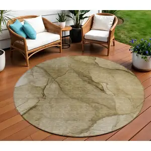 Photo of 8' Brown Beige And Taupe Round Abstract Washable Indoor Outdoor Area Rug