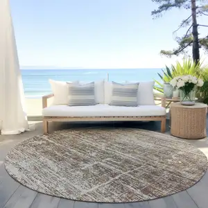 Photo of 8' Brown Beige And Taupe Round Abstract Washable Indoor Outdoor Area Rug