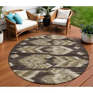 Photo of 8' Brown Beige And Taupe Round Southwestern Washable Indoor Outdoor Area Rug