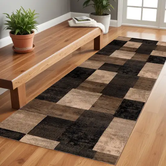 8' Brown Black and Tan Geometric Power Loom Runner Rug Photo 1