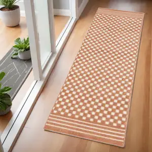 Photo of 6' Brown Geometric Runner Rug