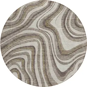 Photo of 8' Brown Ivory And Taupe Round Abstract Washable Indoor Outdoor Area Rug