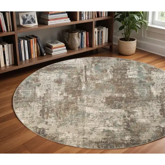 8' Gray and Light Brown Abstract Power Loom Round Rug Photo 1