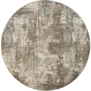 Photo of 8' Brown Round Abstract Power Loom Area Rug