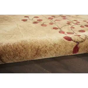 Photo of 8' Brown Round Floral Power Loom Area Rug