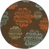 Photo of 8' Brown Round Floral Stain Resistant Indoor Outdoor Area Rug