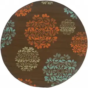 Photo of 8' Brown Round Floral Stain Resistant Indoor Outdoor Area Rug