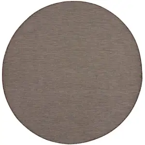 Photo of 8' Brown Round Power Loom Area Rug