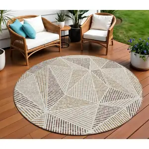 Photo of 8' Brown Taupe And Beige Round Geometric Washable Indoor Outdoor Area Rug