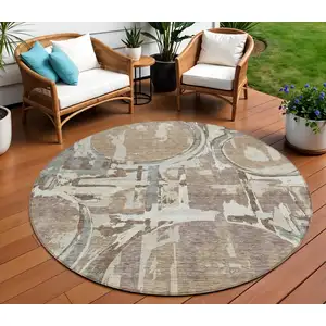 Photo of 8' Brown Taupe And Beige Round Geometric Washable Indoor Outdoor Area Rug