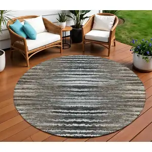 Photo of 8' Brown Taupe And Chocolate Round Striped Washable Indoor Outdoor Area Rug