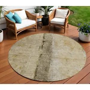 Photo of 8' Brown Taupe And Gold Round Abstract Washable Indoor Outdoor Area Rug