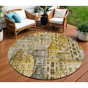 Photo of 8' Brown Taupe And Gold Round Village Houses Washable Indoor Outdoor Area Rug