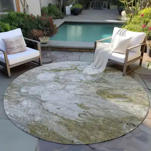 Photo of 8' Brown Taupe And Ivory Round Abstract Washable Indoor Outdoor Area Rug