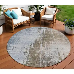 Photo of 8' Brown Taupe And Navy Blue Round Abstract Washable Indoor Outdoor Area Rug