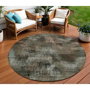 Photo of 8' Brown Taupe And Salmon Round Abstract Washable Indoor Outdoor Area Rug