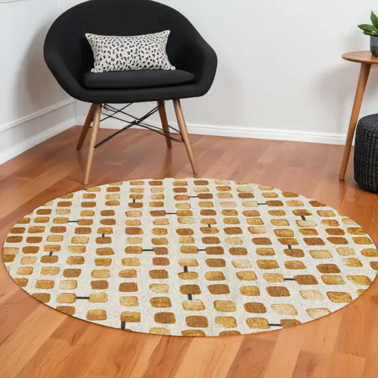 8' Brown and Beige Round Geometric Non Skid Area Rug Photo 1