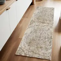 Photo of 8' Brown and Ivory Abstract Distressed Runner Rug