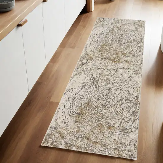 8' Brown and Ivory Abstract Distressed Runner Rug Photo 1