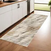 Photo of 8' Brown and Ivory Abstract Distressed Runner Rug