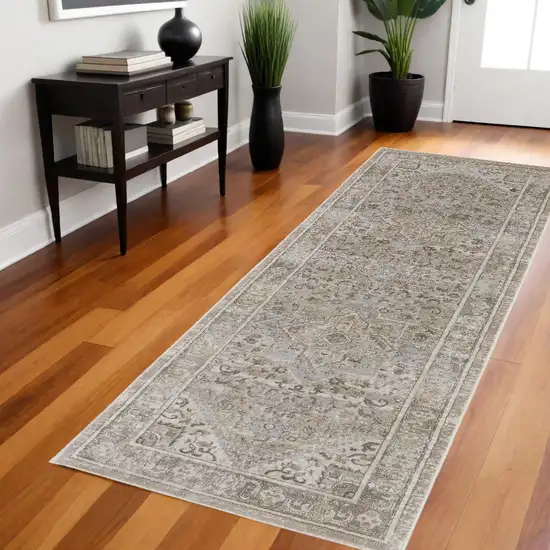 8' Brown and Ivory Medallion Power Loom Distressed Runner Rug Photo 1